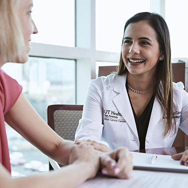 Dr. Mazo talking to a patient