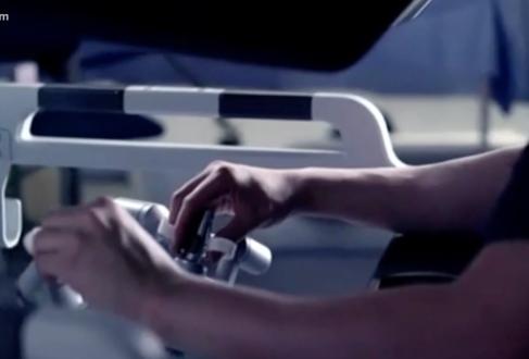 A surgeon operating robotic functions during a procedure